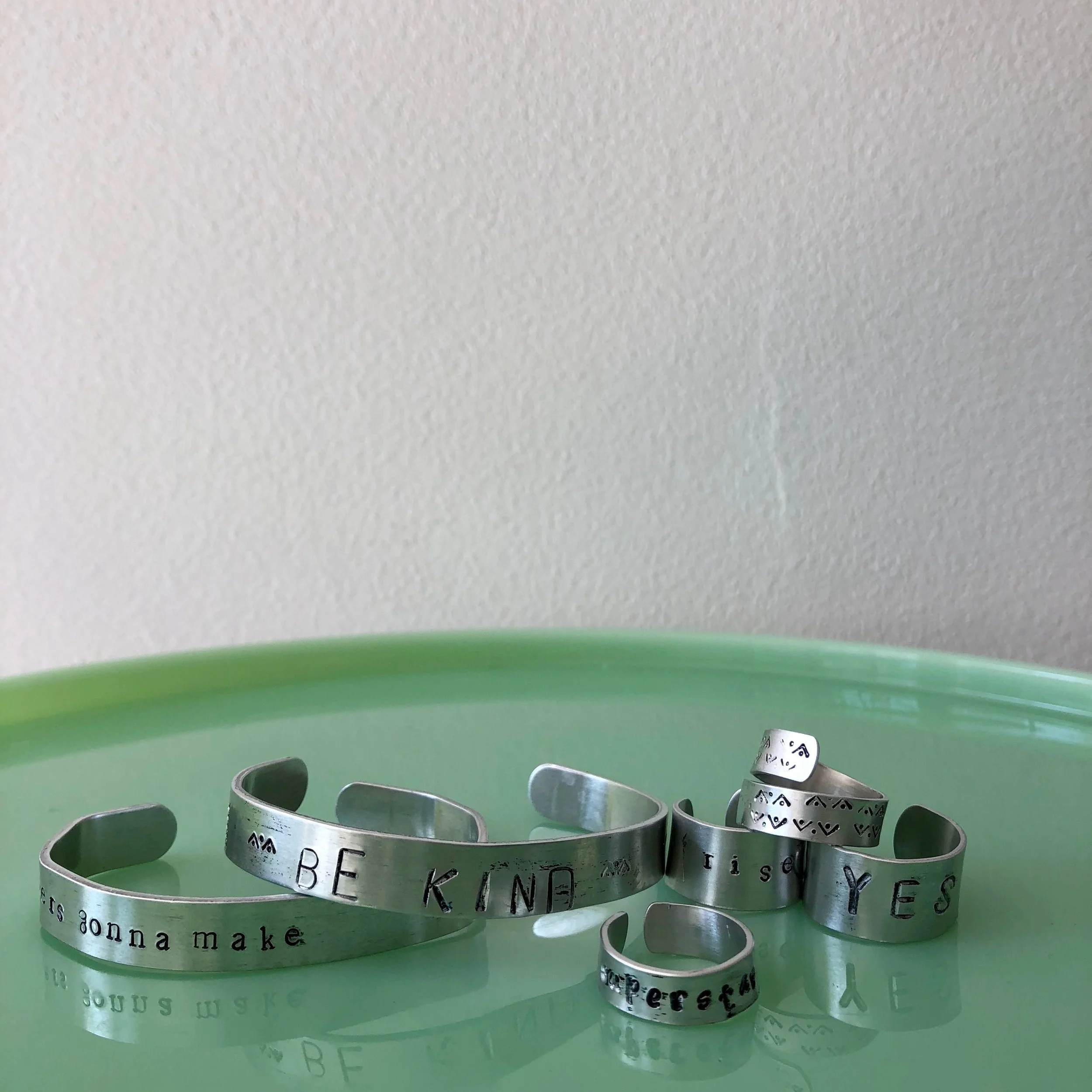 Stamped Metal Jewelry - make personalized metal jewelry. Your choice of 3 items. Choose from bracelets, rings or charms.