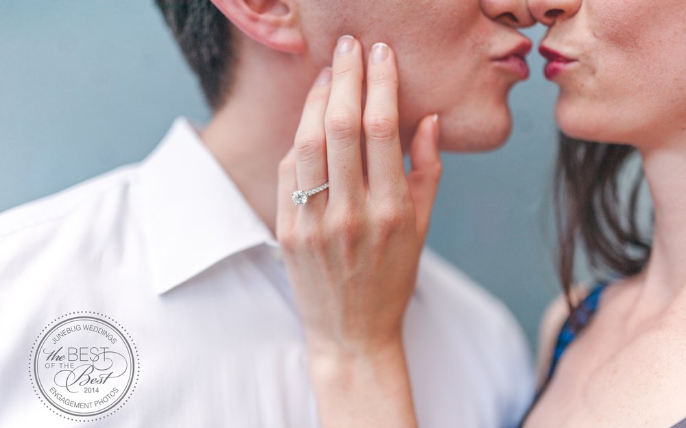 Close engagement portrait showing an engagement ring