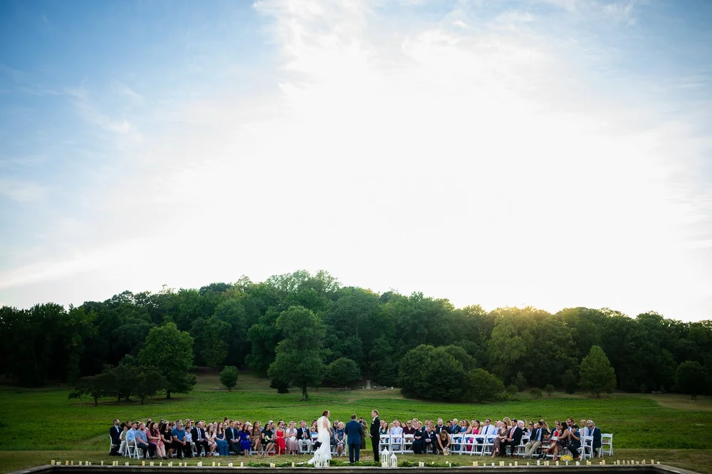 Outdoor wedding ceremony in a meadow at the National Arboretum in Washington DC