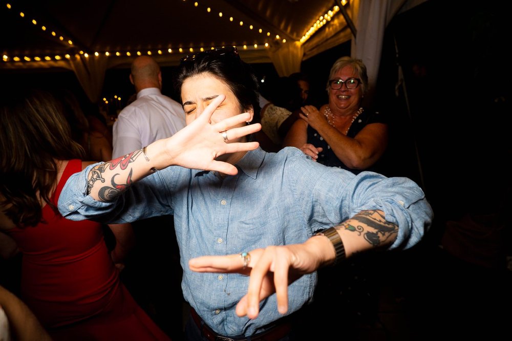 Wedding guests dancing during a lively National Arboretum wedding reception