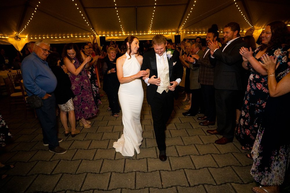 Bride and groom grand entrance during a National Arboretum wedding reception in Washington DC
