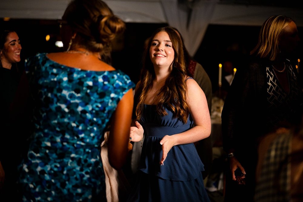 Wedding guest dancing during a lively National Arboretum reception celebration
