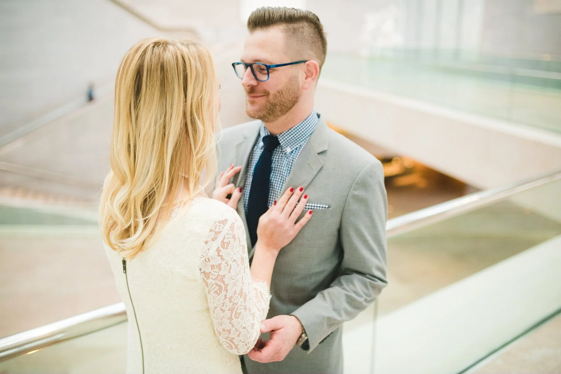 couple-glass-railing-national-gallery-engagement.jpg