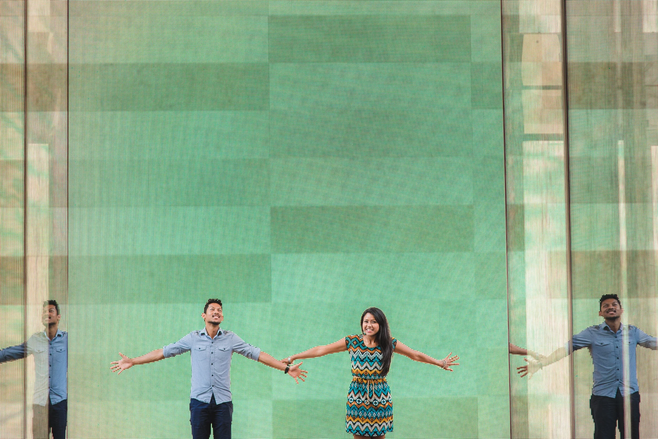 couple-celebrating-glass-reflection-citycenterdc.jpg
