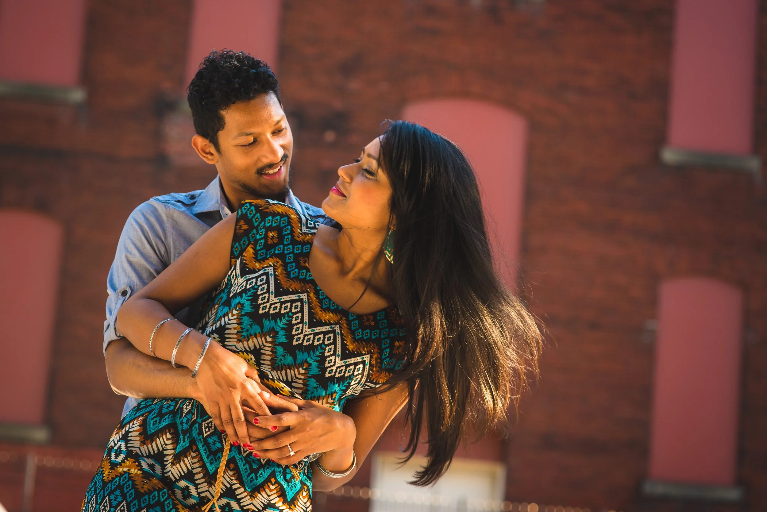 couple-dancing-red-brick-wall-citycenterdc.jpg