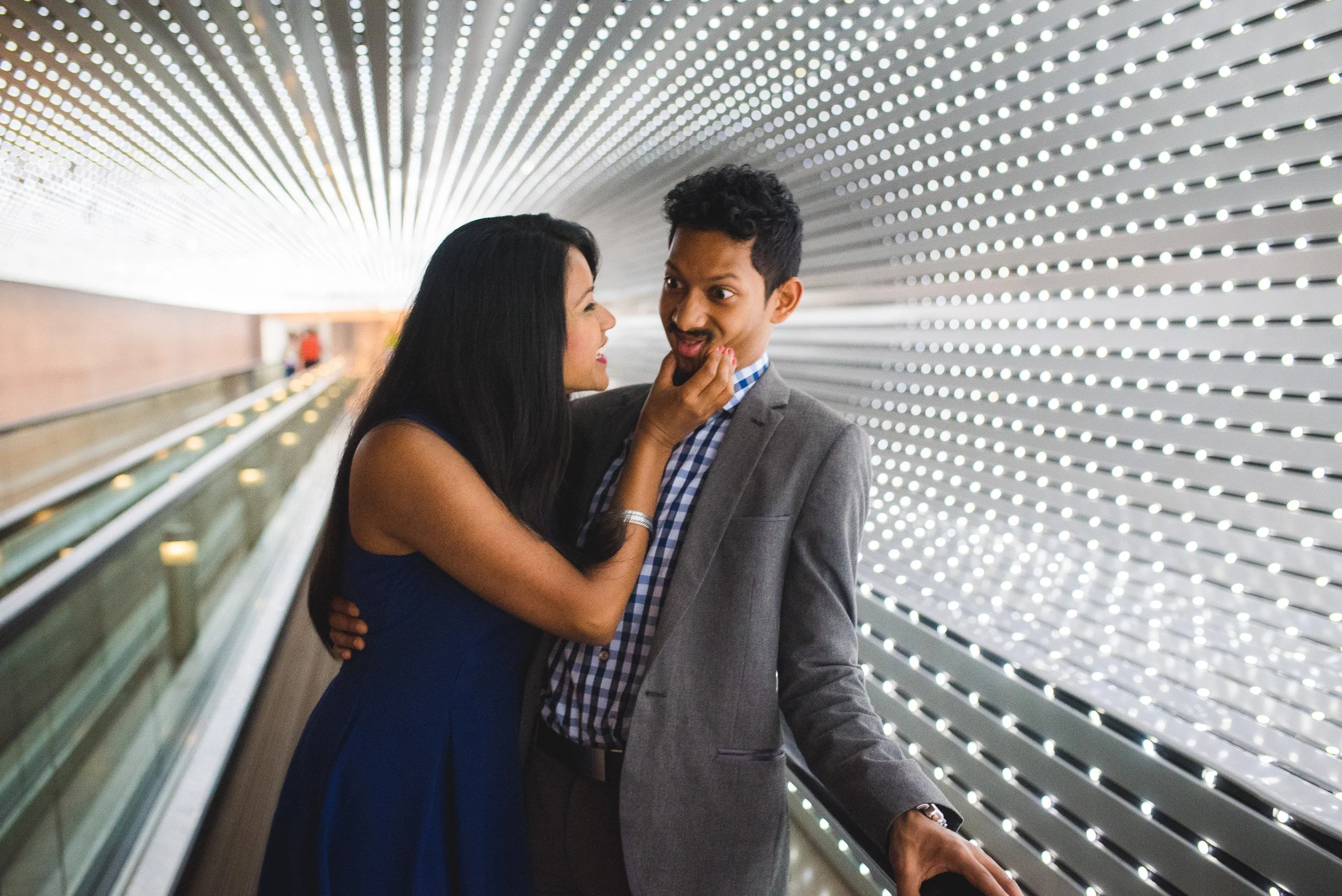 couple-moving-walkway-light-tunnel-national-gallery.jpg