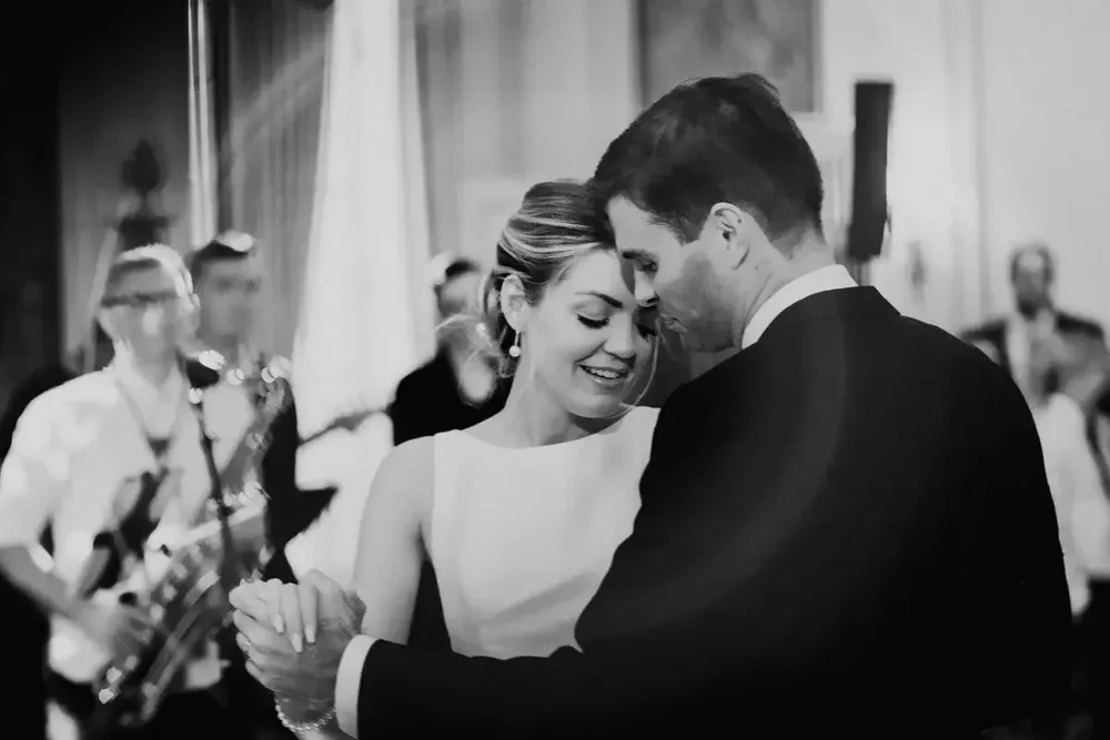 Black and white portrait of the bride and groom sharing their first dance at Meridian House
