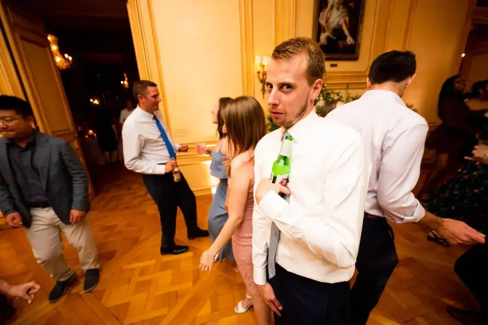 Wedding guests having fun and dancing at the lively Meridian House reception