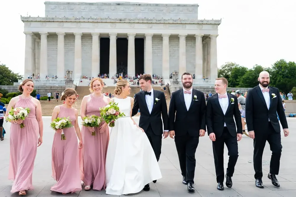 Wedding party walking at the Lincoln Memorial for their Meridian House wedding