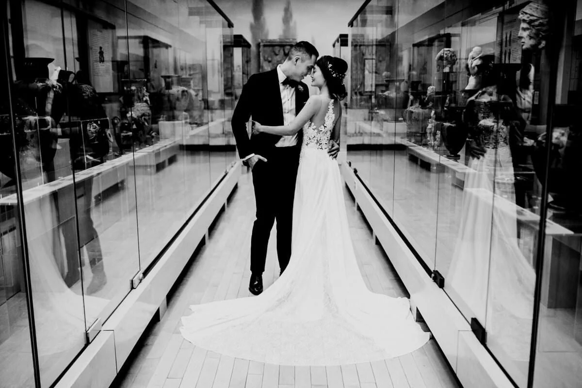 Bride and groom photographed during a Penn Museum wedding by Washington DC wedding photographer Mantas Kubilinskas