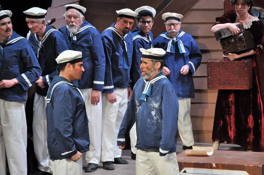 Alan Briones as Ralph confronted by Bob Scrofani as Dick Deadeye, Brett Kroeger in background