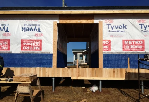 Installation of Air Barrier and Cedar Shingles