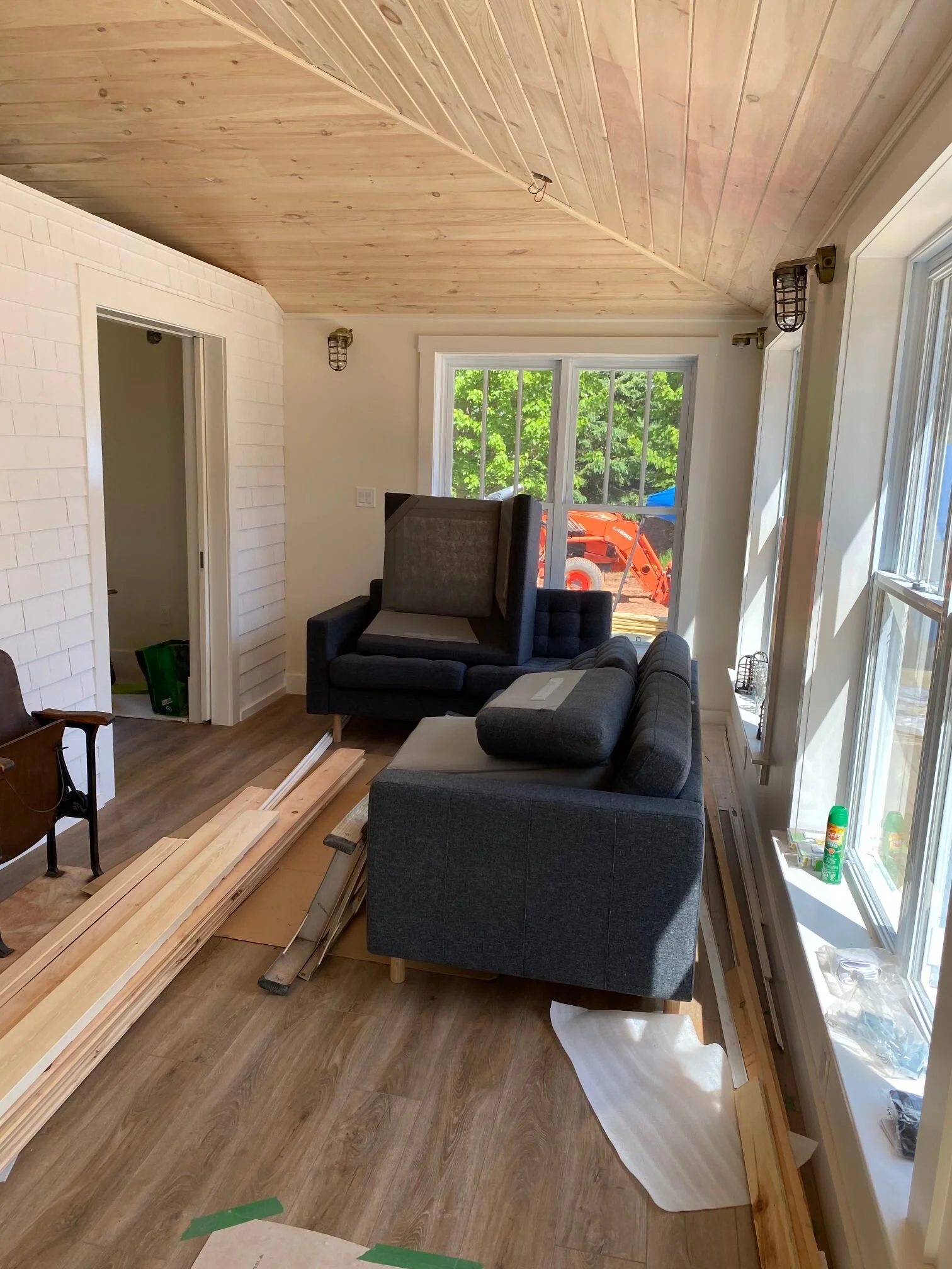 direction of  flooring in sun  porch.jpg