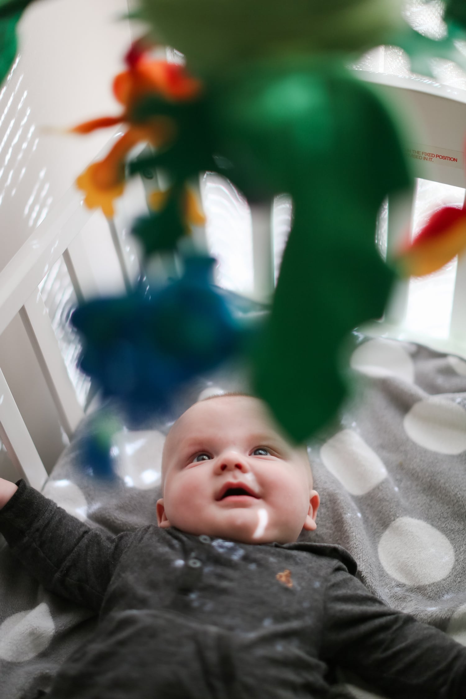 He loves watching his mobile...
