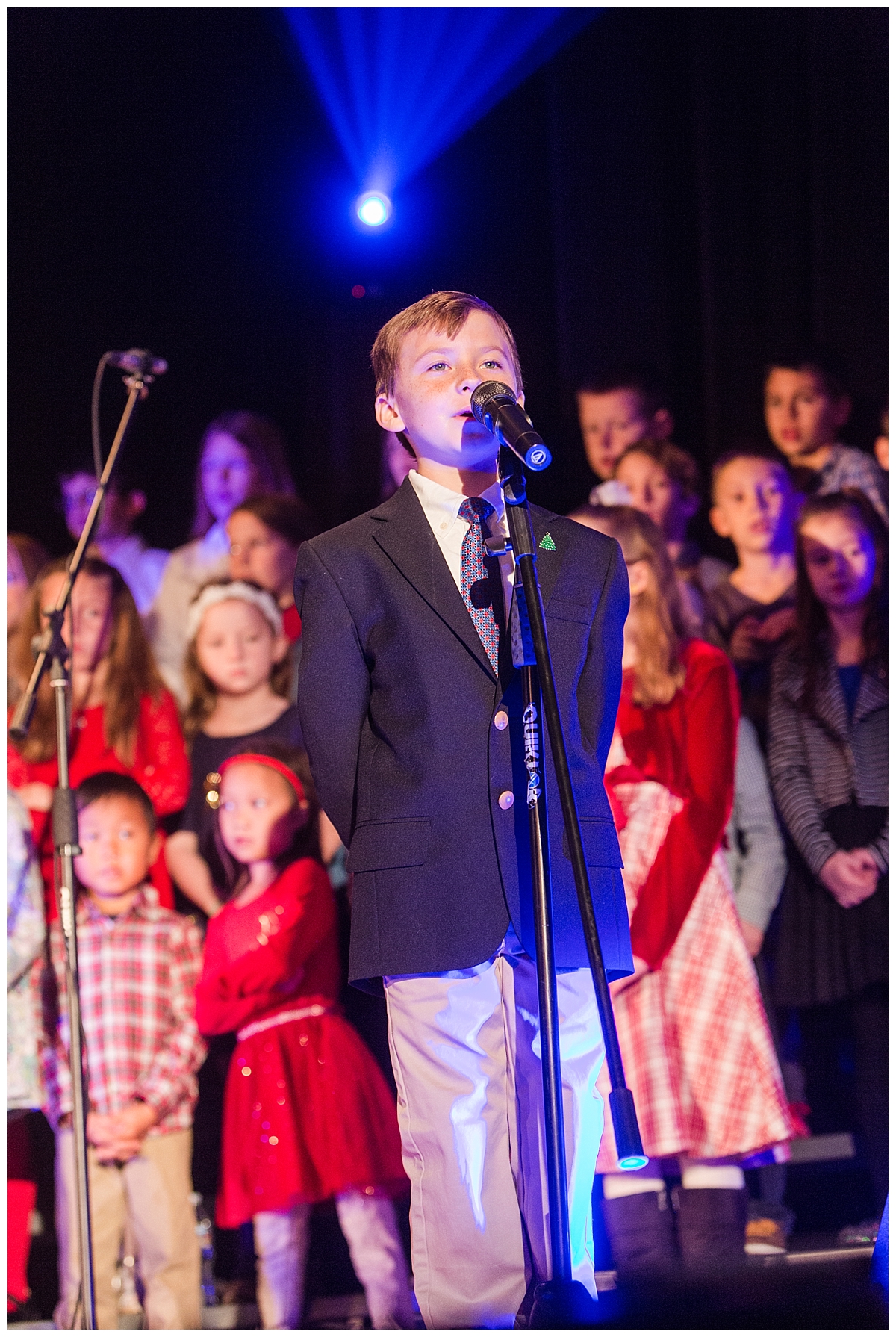 Dean singing part of a duet in church during the service. 