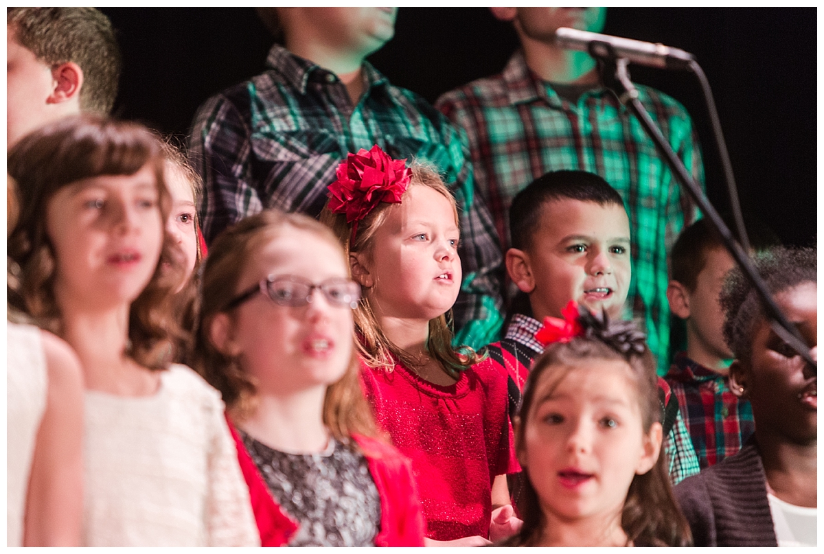 Macy singing in the kids choir for the service.
