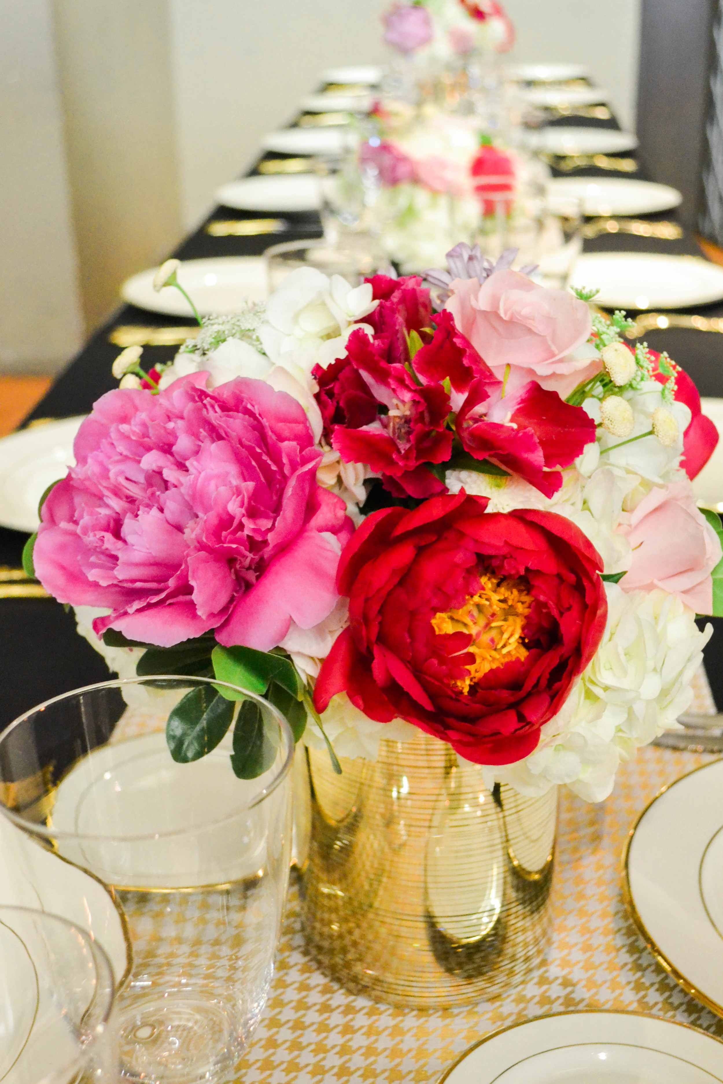 Pink and red bud vase arrangements. Rosehip Social, Brooklyn, NY.