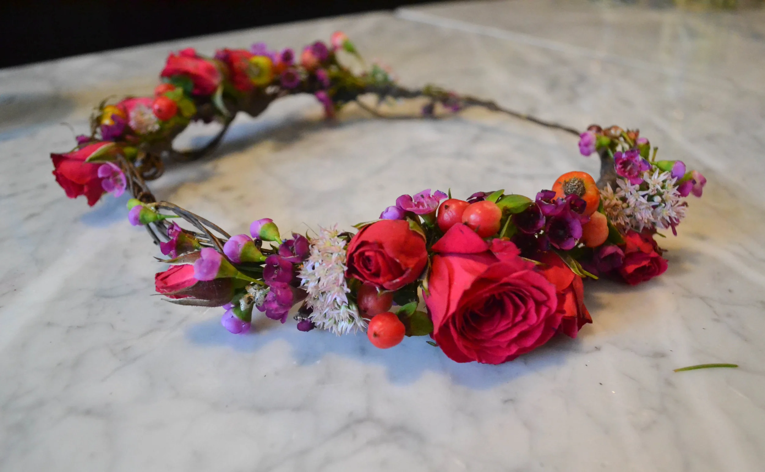 Raspberry Pink and Brown Branchy wreath. Foundry Wedding, LIC. Rosehip Social, Brooklyn NY.