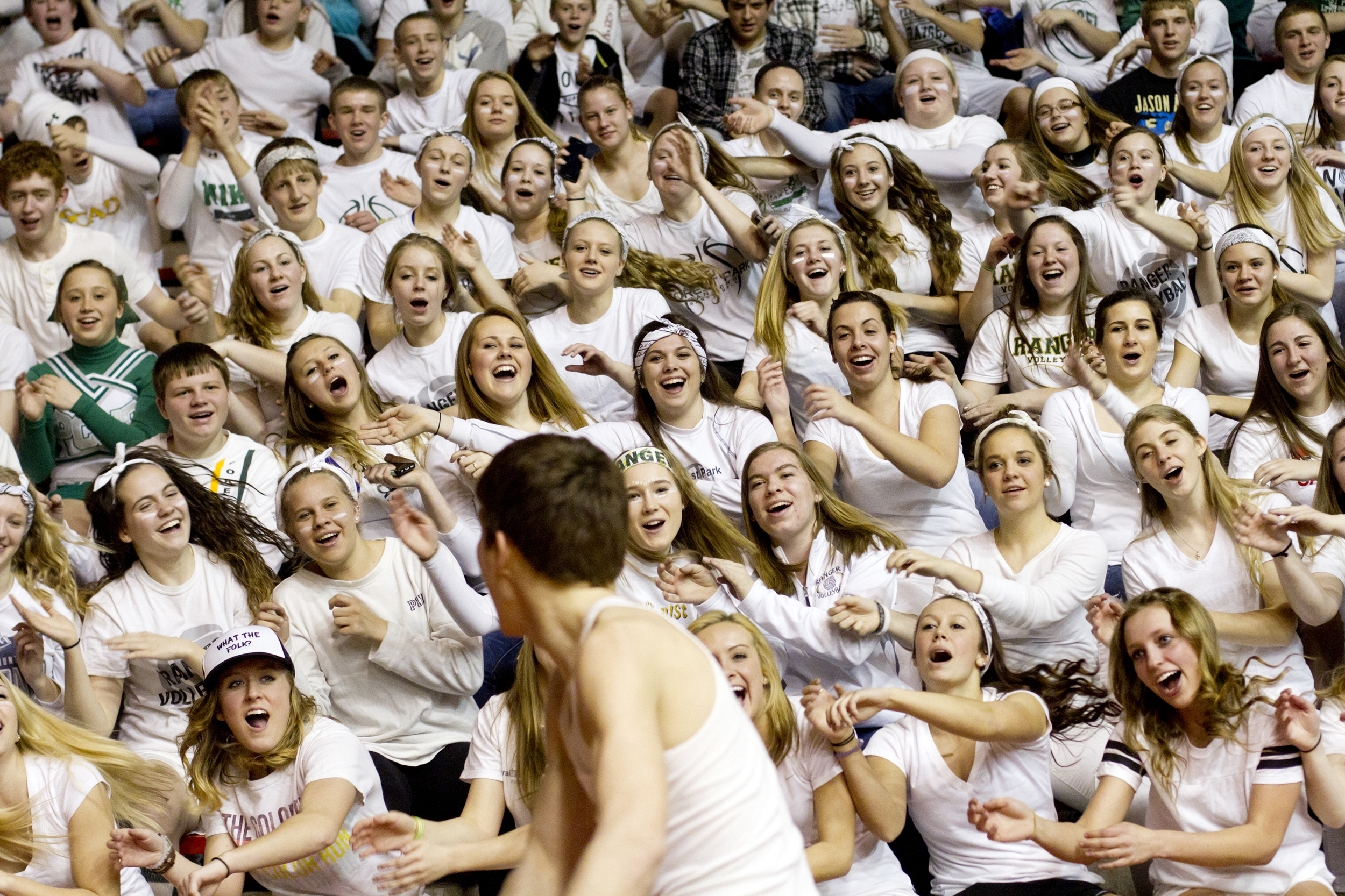  Forest Park senior Joe Mesaris leads the student section in a roller coaster cheer during halftime of the Class 2A boys basketball sectional against Tell City at Memorial Gym in Huntingburg, Ind. on March 3, 2015. The Rangers won 80-41.&nbsp; 