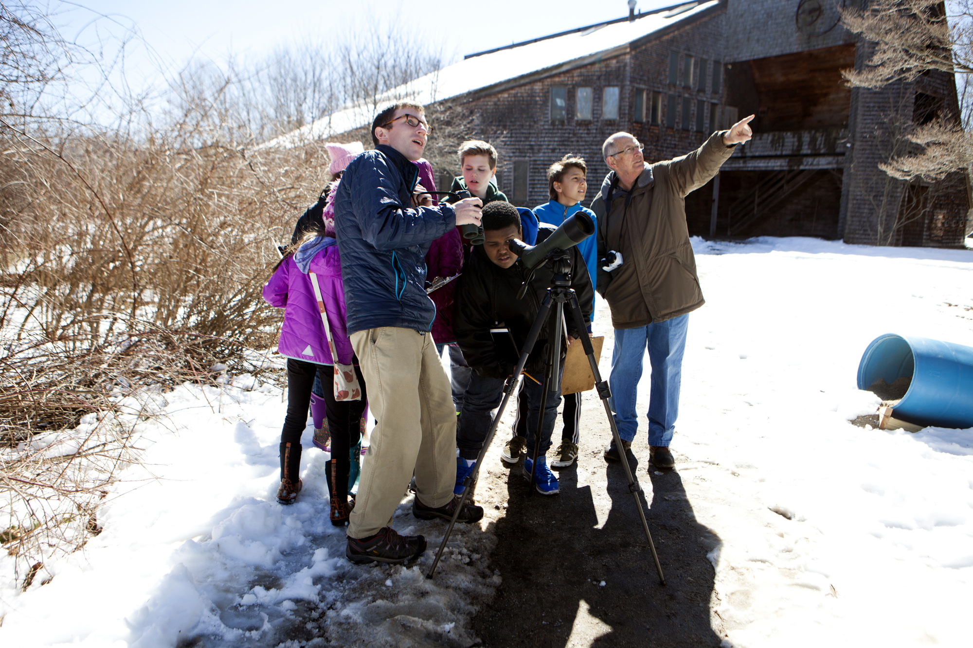  Maine Audubon Staff Naturalist Doug Hitchcox leads a bird walk for King Middle School students at Gilsland Farm Audubon Center in Falmouth, Maine on April 3. 