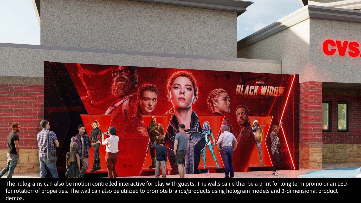 A promotional display for the Marvel movie 'Black Widow' featuring large images of the main characters. Several people are standing in front of the display, some taking photos.