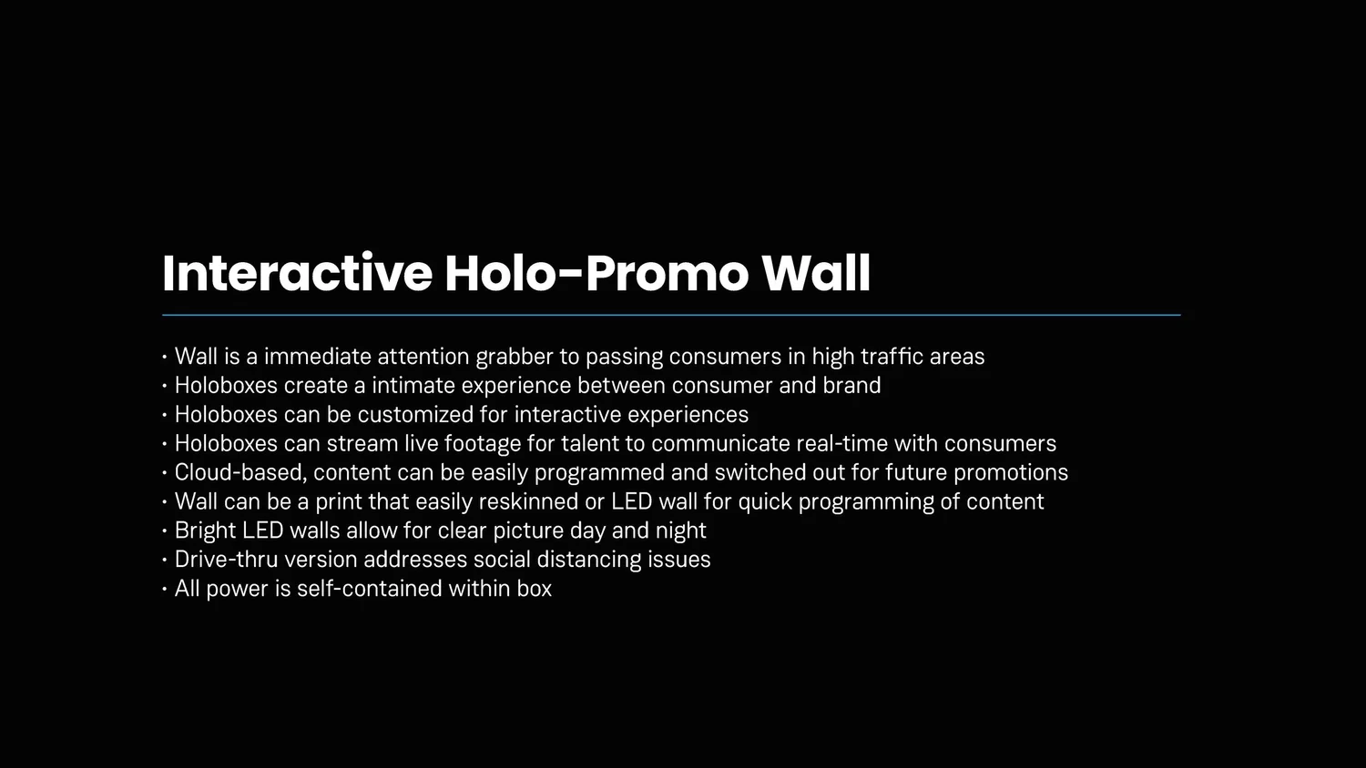 Slide titled 'Interactive Holo-Promo Wall' with bullet points describing features such as high traffic attention grabber, customizable for interactive experiences, live footage streaming, cloud content, LED or print options, and self-contained power.