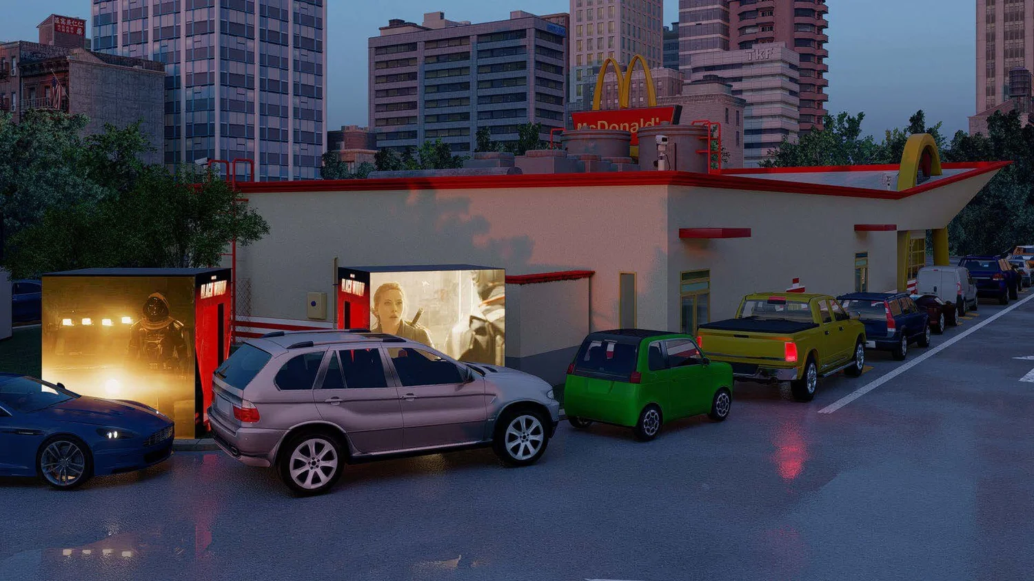 A McDonald's restaurant in an urban area with multiple cars parked in front. The building has a classic fast-food design with a large sign on the roof and a digital menu board.