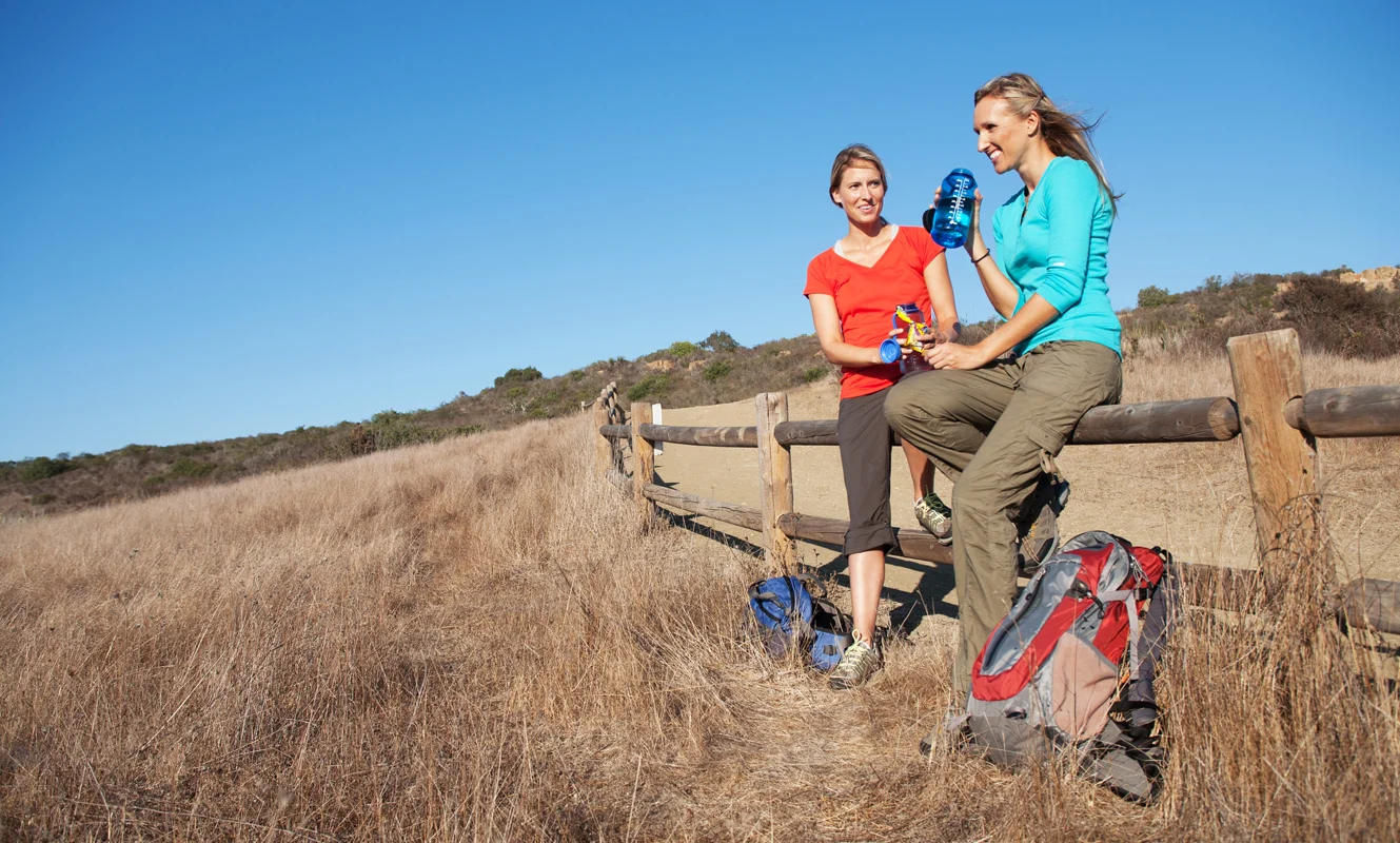 Girls taking a Nalgene water break. san diego lifestyle photographer, san diego lifestyle photography, southern California lifestyle photographer, California lifestyle photographer, lifestyle photo