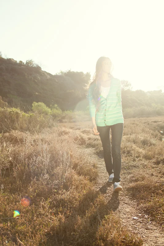 Girl taking a peaceful walk in a field. san diego lifestyle photographer, san diego lifestyle photography, southern California lifestyle photographer, California lifestyle photographer