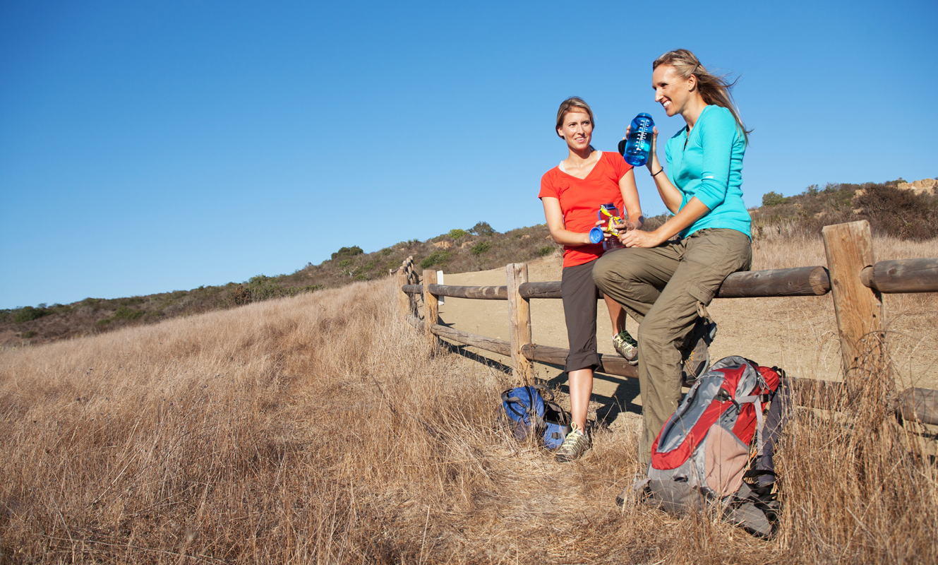 Girls hiking and stopping for a water break. san diego commercial photography, san diego commercial photographer, southern California commercial photographer, California commercial photographer