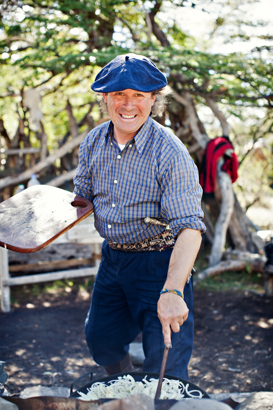 Portrait of a gaucho in Patagonia cooking over a fire. san diego travel photography, san diego travel photographer, southern California travel photographer, California travel photographer