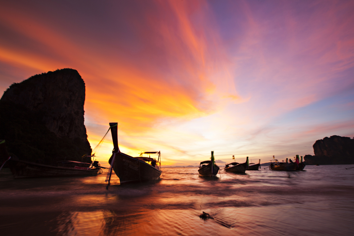 boats at sunset on railay beach, thailand. san diego commercial photography, san diego commercial photographer, southern California commercial photographer, California commercial photographer