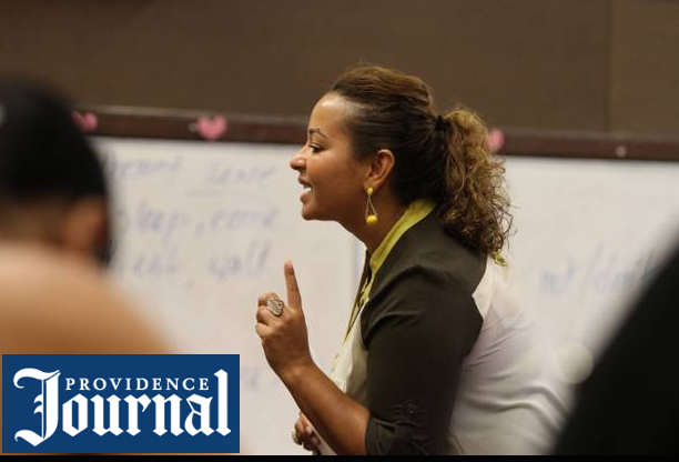 Malaika Alexander, 33, the daughter of Peace Corps volunteers, teaches English at the Genesis Center in Providence .