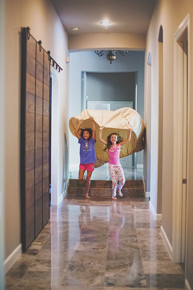 Much of the night was spent running around the house playing the 'mushroom game' with fitted bedsheets (they would run fast and then cover themselves under the sheet creating a little bubble house). This reminds me of the parachute game we played as kids in PE. 