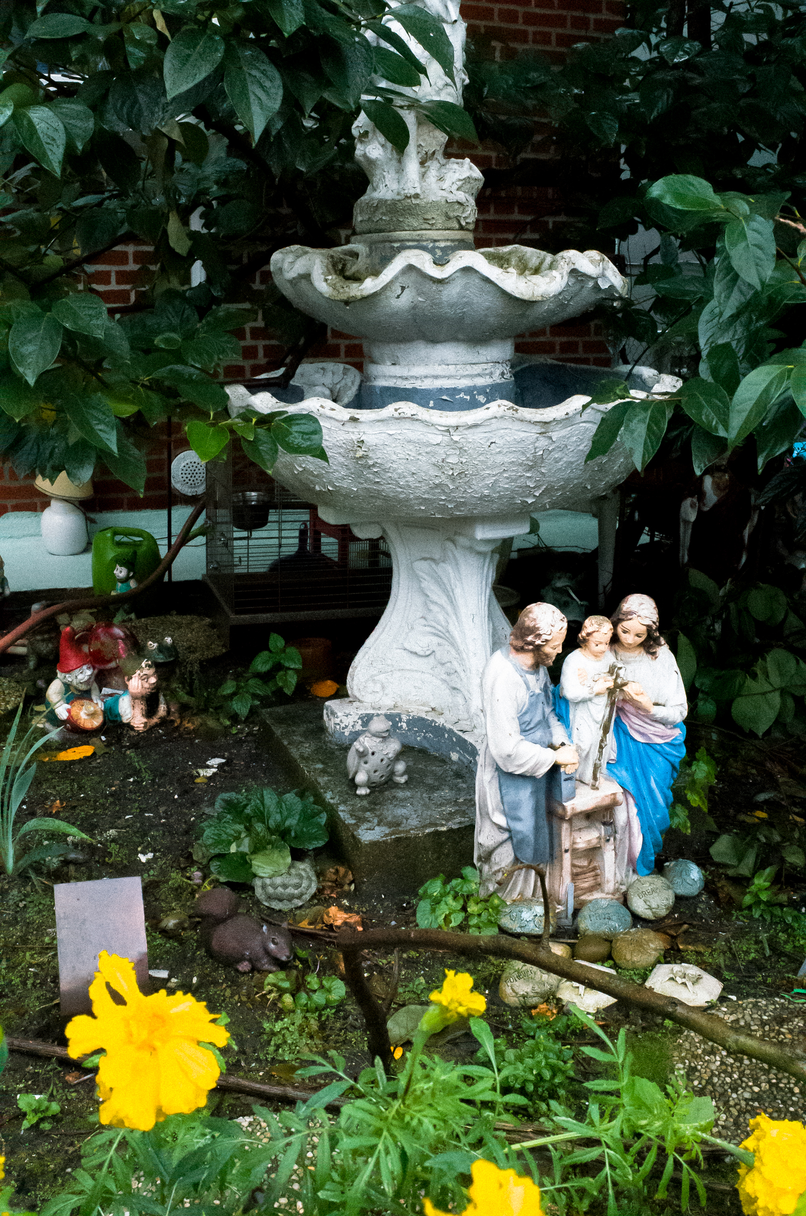 Little gnome mixed in with fake squirrels and turtles, and then of course, the Lord's family. Rad.