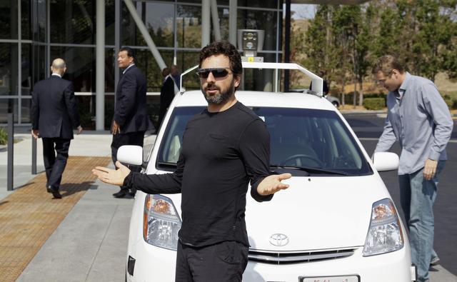 Eric Risberg/The Associated Press Google co-founder Sergey Brin , who emigrated from Russia, gestures after riding in a driverless car with Gov. Jerry Brown, left, in September 2012 in Mountain View. One way to punish Russia is to attract more like Brin