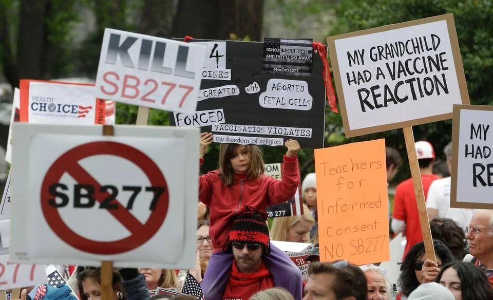 Protesters against legislation requiring California schoolchildren to get vaccinated rally at the Capitol this month. Senate Bill 277, if approved, would require most California parents to vaccinate their children as a condition of enrolling them in private or public schools. Rich Pedroncelli The Associated Press