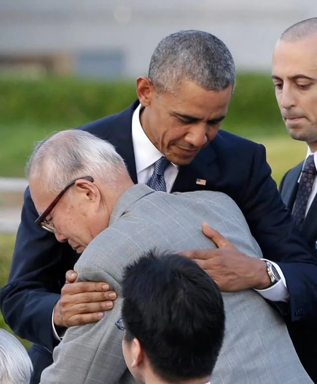 President Barack Obama hugs Shigeaki Mori, an atomic bomb survivor, during a ceremony at Hiroshima Peace Memorial Park in Hiroshima, Japan, last month. Obama became the first sitting U.S. president to visit the site of the world’s first atomic bomb attack, bringing global attention to survivors and to his unfulfilled vision of a world without nuclear weapons. (Carolyn Kaster - The Associated Press)