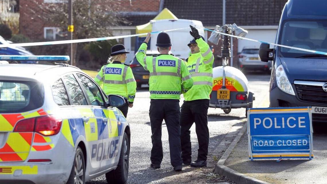 Police officers seal off a cul-de-sac in Salisbury, England, near to the home of former Russian ex-spy Sergei Skripal as a nerve agent is believed to have been used to critically injure him and his daughter Yulia. Britain's Home Secretary says the investigation into the nerve agent attack on a Russian ex-spy and his daughter is focusing on three sites â his home, a pub and a restaurant. Andrew Matthews AP