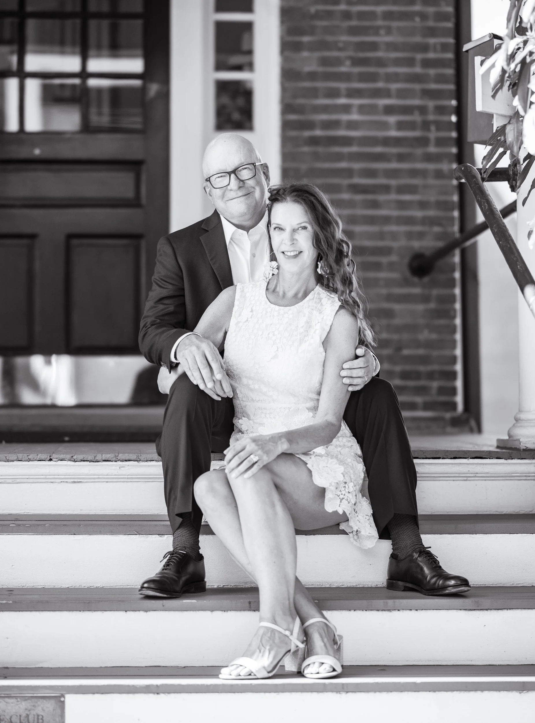 Todd & Alicia sharing a quiet moment on the courthouse steps after their Annapolis civil court wedding.