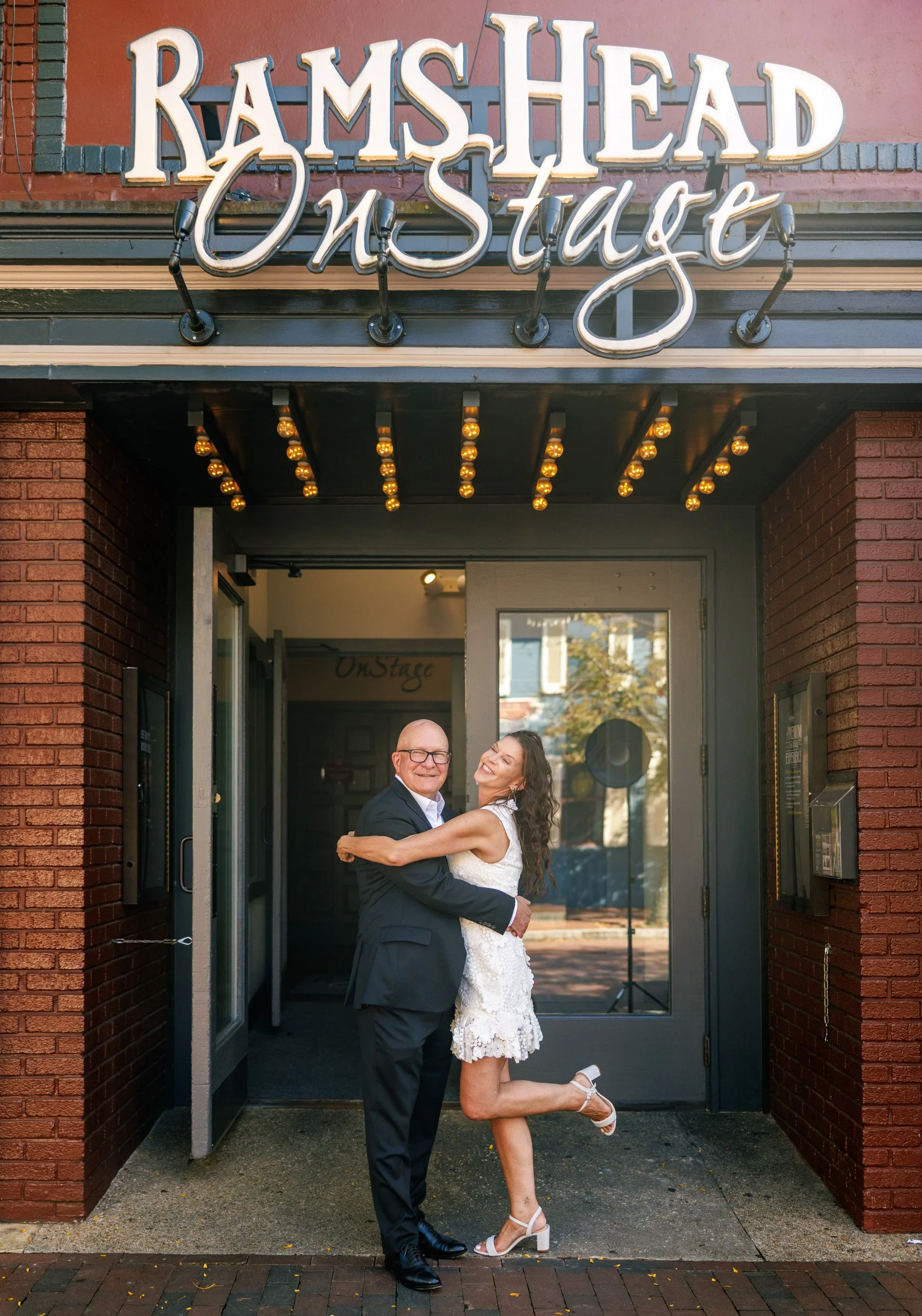 Annapolis courthouse wedding couple at Rams Head On Stage where they had their first date in downtown Annapolis