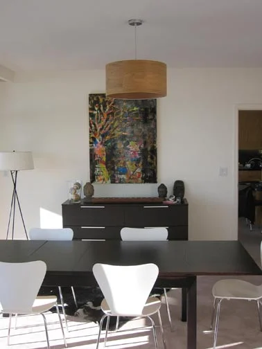Sadly, Joanna, Paul, and Noah have moved away now, but their lovely home in West Van had a big collection of my work in it. Here is a photo of their modern dining room.