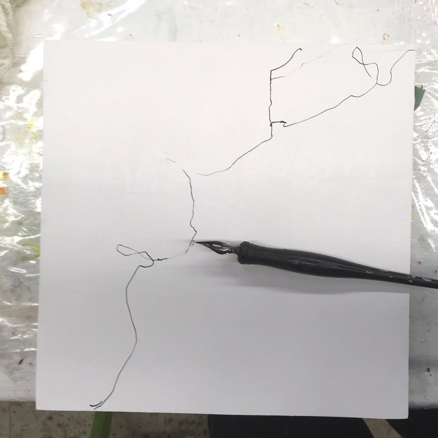 My rough outline looks more like an electrocuted worm.