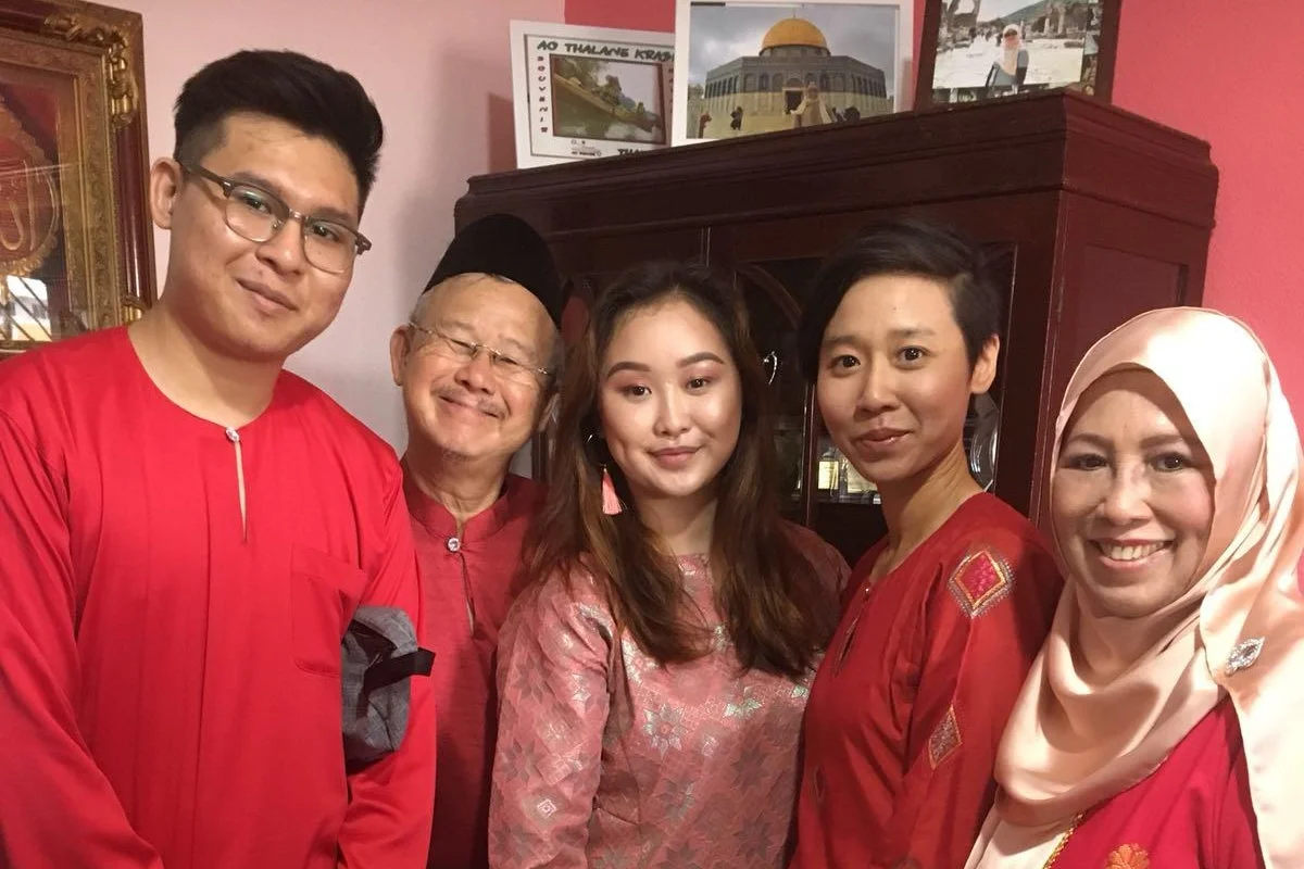 Aqilah (centre) with her family
