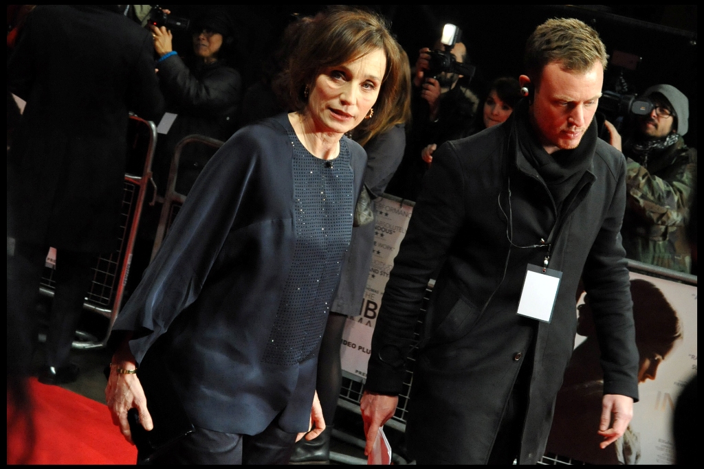 Kristin Scott Thomas (Four Weddings and a Funeral, Mission Impossible) is unhappy about my opinion on her rhinestone studded shirt before I've even had a chance to formulate it.