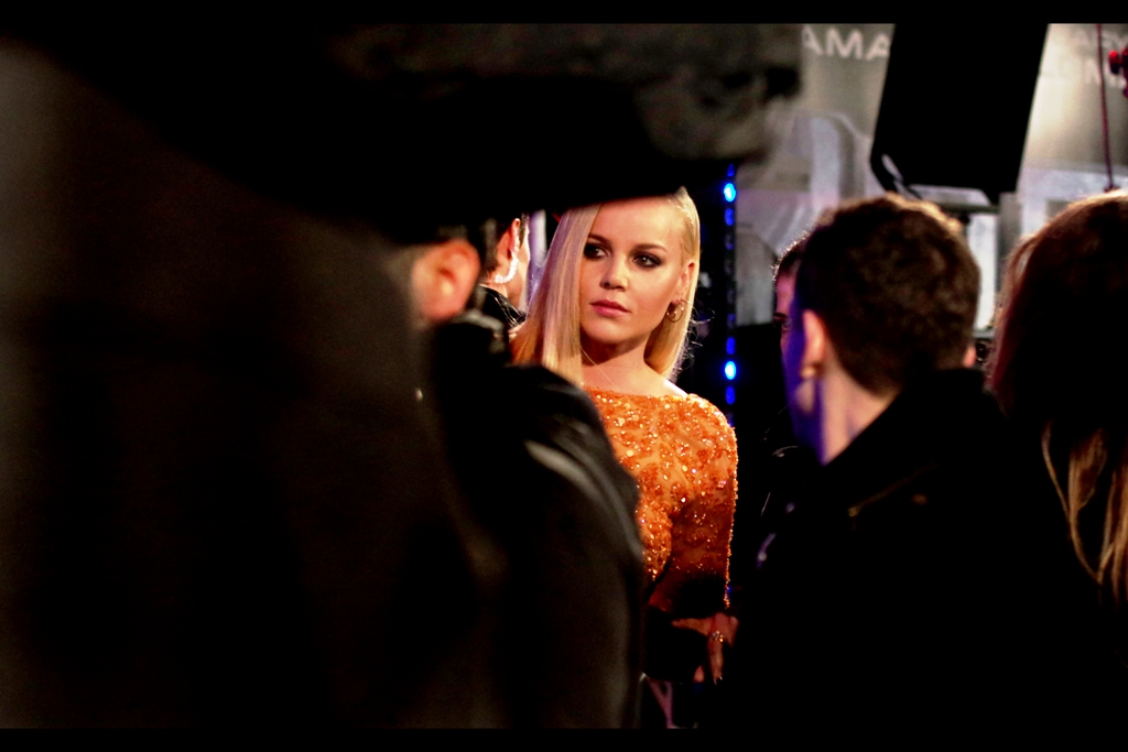 "Somebody mentioned something about a sucker punch but I didn't catch the context " .Abbie Cornish was also in the movie Limitless with Bradley Cooper, and the movies W.E and Bright Star both of whose premieres she did not attend. So.. that's pretty cool. (However, the movie Sucker Punch? Not cool> Sooooo very not cool)