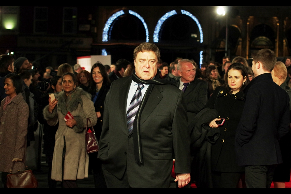 Loves Downton Abbey and won't stand to have an unkind thing said about it.