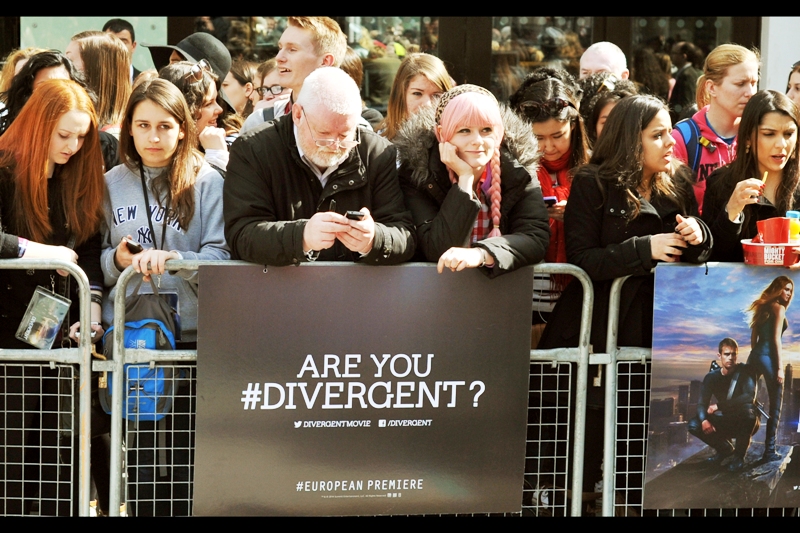 Am I hashtagDivergent? No... I'm deeply cynical about a post-war, post-apocalyptic society that chooses to divide its people into unique, easily-merchandisable logotypes whereby it's totally freaking obvious which group the heroes/rebels come from. That was the stregth of Hunger Games - Katniss wasn't from the _"hey you're special district"_ - she was the hero who rose to combat society's injustice because she DID, not because some facebook profile threw out 'hashtag divergent' to help advertisers sell stuff to her based on her likes and dislikes on social media. And tell the government to keep an eye on her.