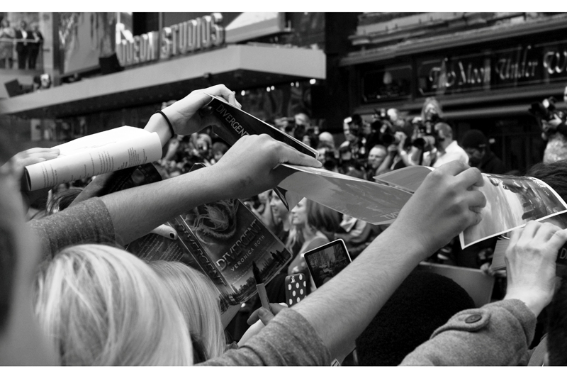 Oh, good. It's caught on in my section of the crowd, too. (Is somebody holding up a Hunger Games Book?? OMG Awesome if so)