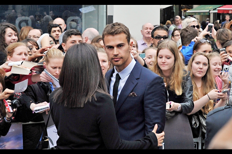 Good news. If that screaming you're hearing is coming from you and you're female, that means you've just realised that Theo James has entered your part of the crowd. I assume he plays whatever role Liam Hemsworth plays in The Hunger Games in this movie.